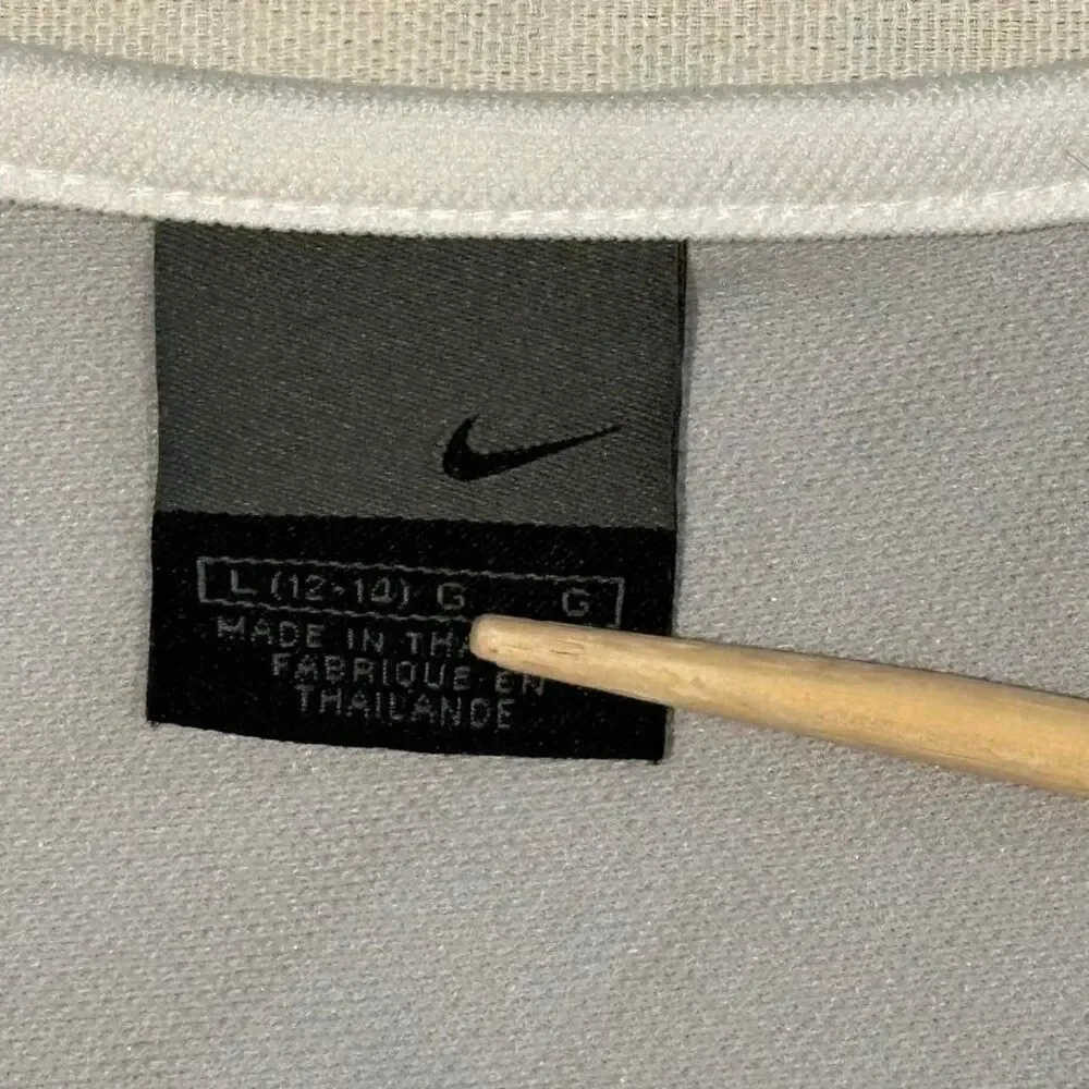 Nike Women's Grey and White T-shirt